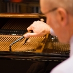 Paul Fox tuning a piano