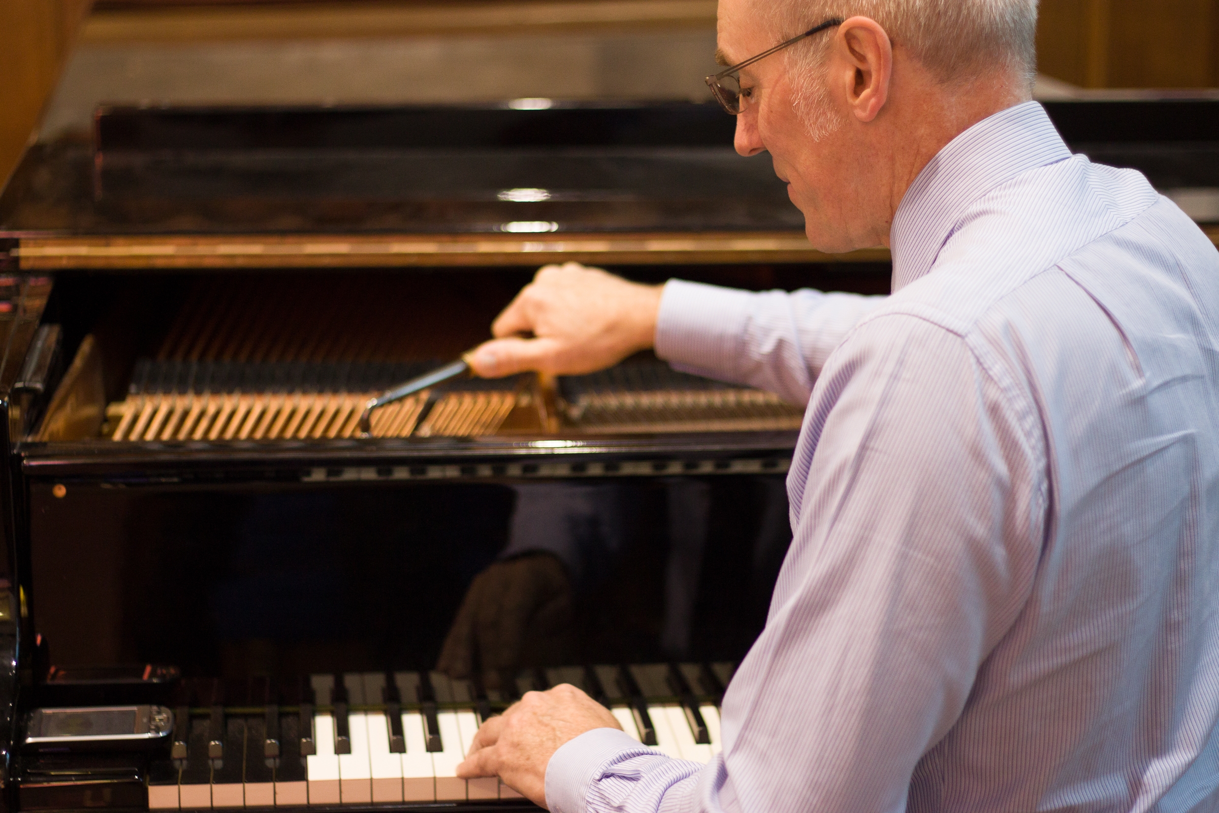 Paul Fox tuning a piano